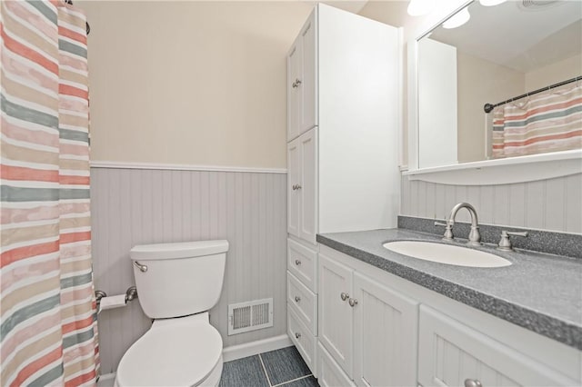 1 Briar Way, Perinton, NY 14450 - full bath with vanity, a wainscoted wall, toilet, tile patterned floors, and a shower with curtain