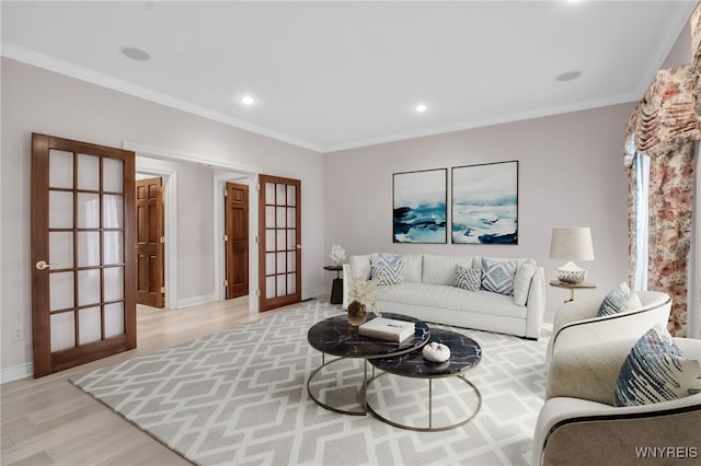 25 Davinci Ct, Amherst, NY 14221 - living room with french doors, light wood-style floors, baseboards, crown molding, and recessed lighting