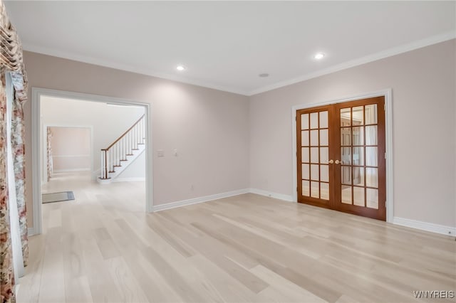 25 Davinci Ct, Amherst, NY 14221 - unfurnished room with french doors, light wood-style floors, baseboards, crown molding, and stairway