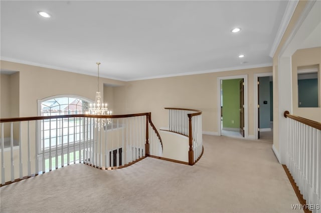 25 Davinci Ct, Amherst, NY 14221 - hall with an upstairs landing, a chandelier, ornamental molding, recessed lighting, and carpet floors