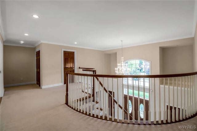 25 Davinci Ct, Amherst, NY 14221 - corridor featuring an upstairs landing, a chandelier, recessed lighting, baseboards, and carpet