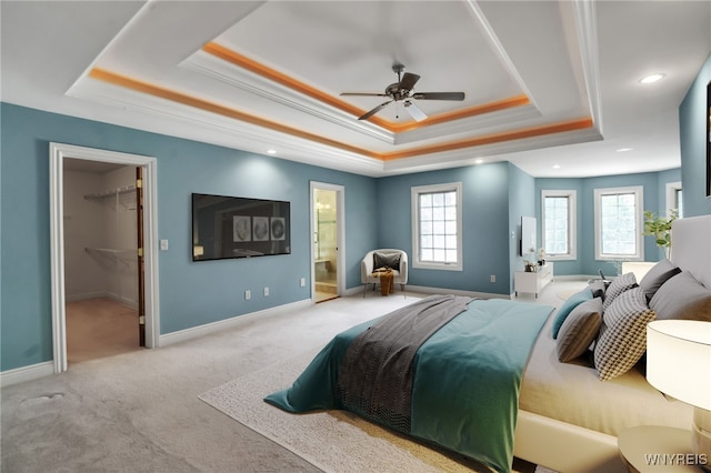 25 Davinci Ct, Amherst, NY 14221 - bedroom featuring a tray ceiling, carpet floors, baseboards, a spacious closet, and ensuite bath