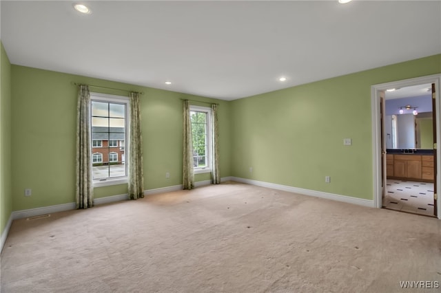 25 Davinci Ct, Amherst, NY 14221 - spare room with light carpet, baseboards, and recessed lighting