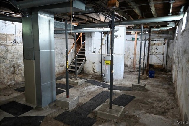 801 Ballantyne Rd, Syracuse, NY 13207 - unfinished basement featuring gas water heater and stairs