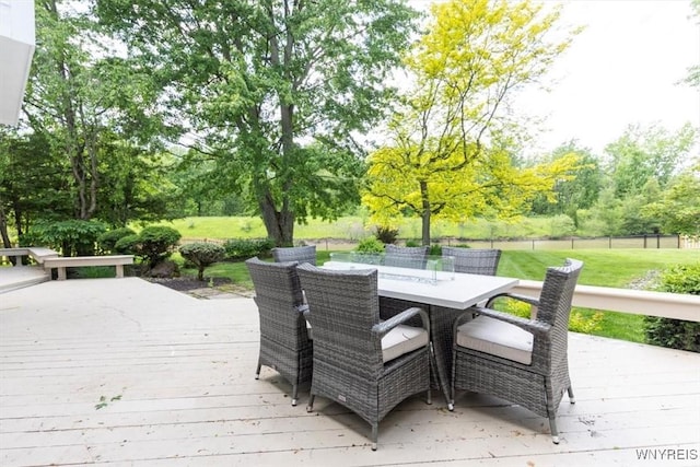 54 Contessa Ct, Amherst, NY 14221 - wooden terrace featuring outdoor dining space and view of wooded area