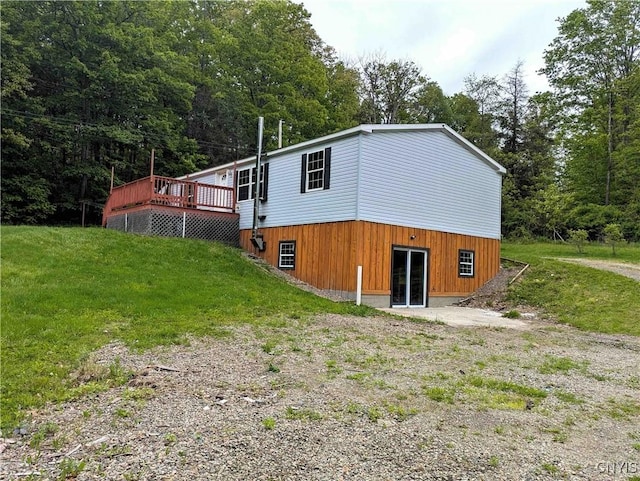 3377 Beeman Hollow Rd, Erwin, NY 14801 - view of property exterior with a wooden deck, a forest view, and a lawn