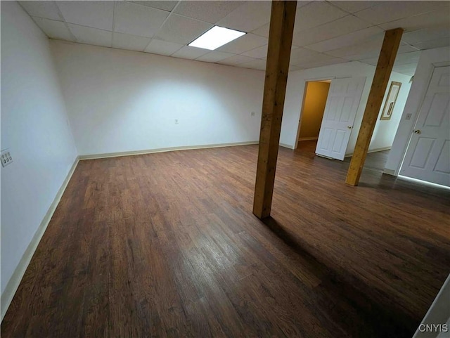 3377 Beeman Hollow Rd, Erwin, NY 14801 - empty room with dark wood-type flooring, baseboards, and a drop ceiling