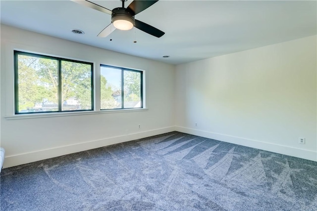 100 Eastland Ave, Brighton, NY 14618 - spare room with baseboards and dark carpet