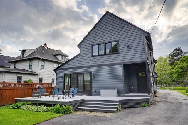 100 Eastland Ave, Brighton, NY 14618 - back of property featuring a wooden deck