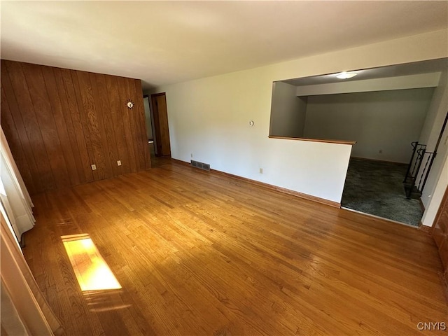 9385 Wickham Dr, Cicero, NY 13029 - empty room with wood finished floors and baseboards