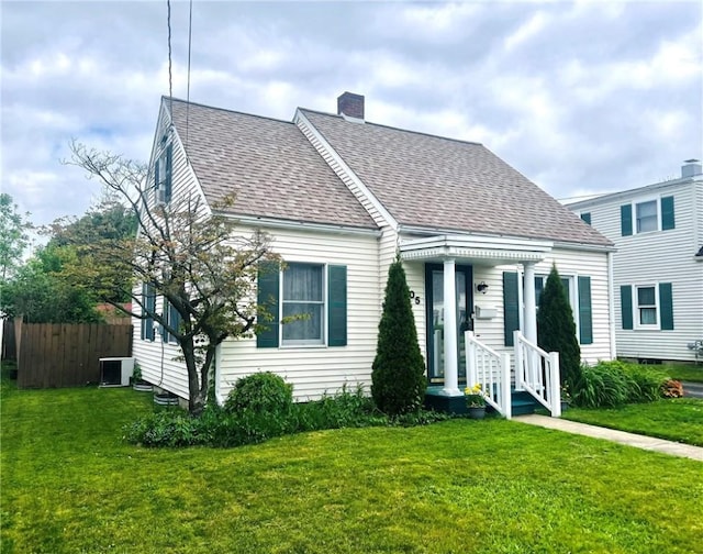 305 S Hoffman St, Elmira-City, NY 14904 - view of front of home with central AC unit, roof with shingles, and a chimney