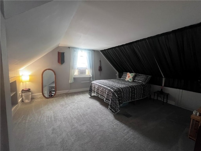 305 S Hoffman St, Elmira-City, NY 14904 - carpeted bedroom with lofted ceiling, cooling unit, and baseboards