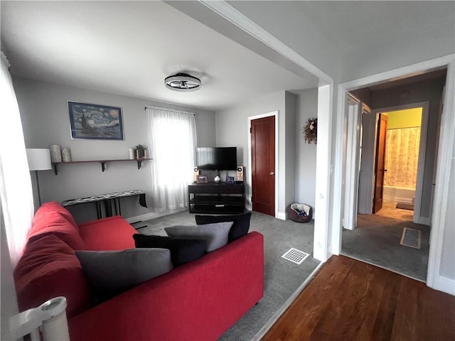 305 S Hoffman St, Elmira-City, NY 14904 - living area with wood finished floors and baseboards