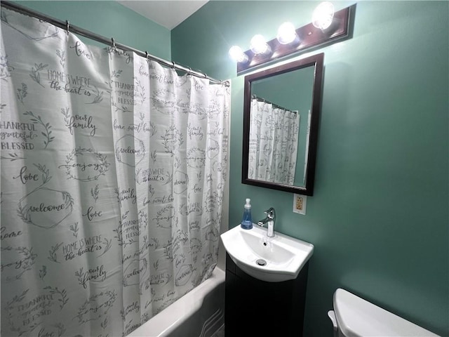 305 S Hoffman St, Elmira-City, NY 14904 - bathroom featuring toilet, vanity, and shower / bath combo