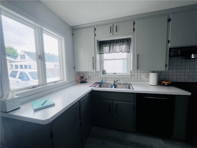 305 S Hoffman St, Elmira-City, NY 14904 - kitchen featuring a sink, backsplash, and light countertops