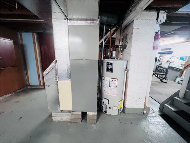 305 S Hoffman St, Elmira-City, NY 14904 - utility room with water heater and heating unit