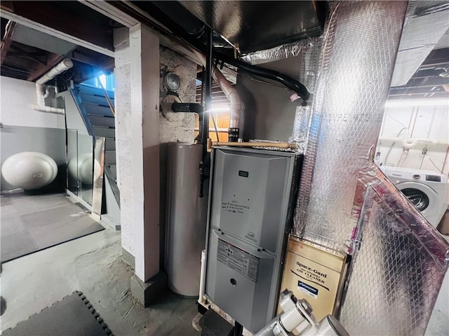 305 S Hoffman St, Elmira-City, NY 14904 - utility room featuring washer / clothes dryer and gas water heater