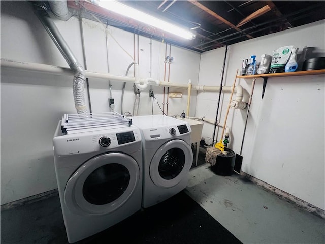 305 S Hoffman St, Elmira-City, NY 14904 - laundry area featuring washing machine and clothes dryer
