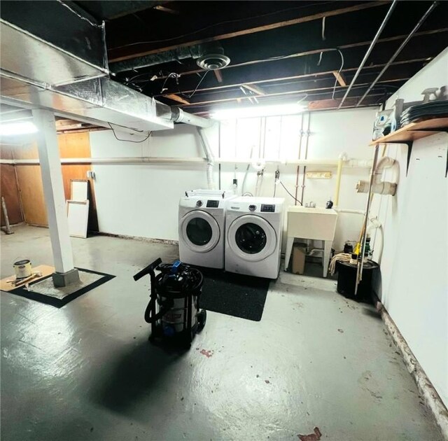 305 S Hoffman St, Elmira-City, NY 14904 - unfinished below grade area featuring separate washer and dryer and a sink