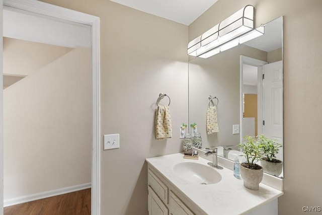 4962 Tall Oaks Dr, Manlius, NY 13066 - bathroom with wood finished floors and vanity