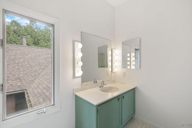 4962 Tall Oaks Dr, Manlius, NY 13066 - bathroom with vanity and baseboards