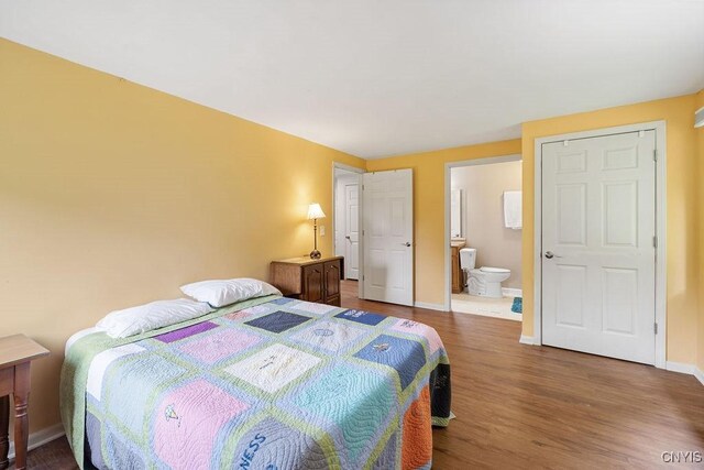 4962 Tall Oaks Dr, Manlius, NY 13066 - bedroom with wood finished floors and ensuite bathroom