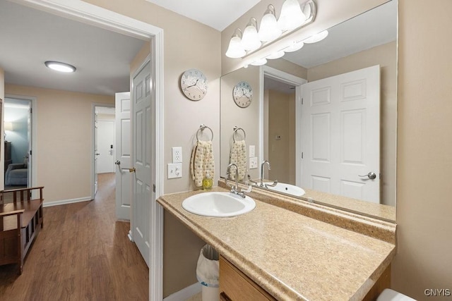 4962 Tall Oaks Dr, Manlius, NY 13066 - bathroom with wood finished floors and vanity