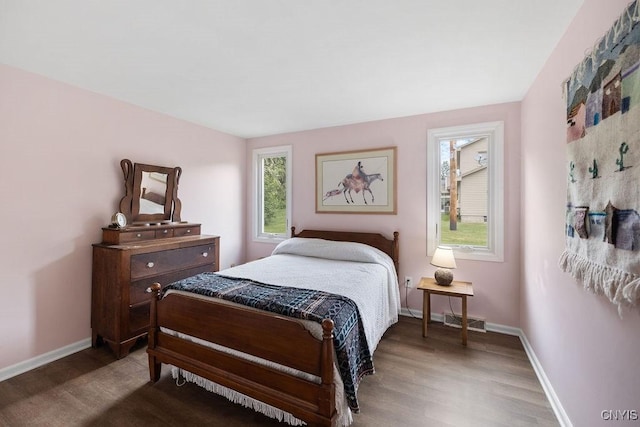 4962 Tall Oaks Dr, Manlius, NY 13066 - bedroom featuring wood finished floors and baseboards