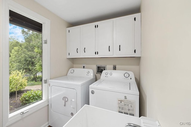 4962 Tall Oaks Dr, Manlius, NY 13066 - laundry area with cabinet space and washing machine and clothes dryer