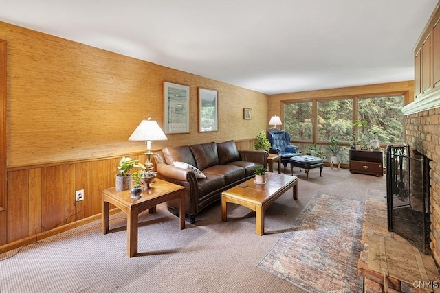 4962 Tall Oaks Dr, Manlius, NY 13066 - living area with light carpet, a brick fireplace, and wood walls