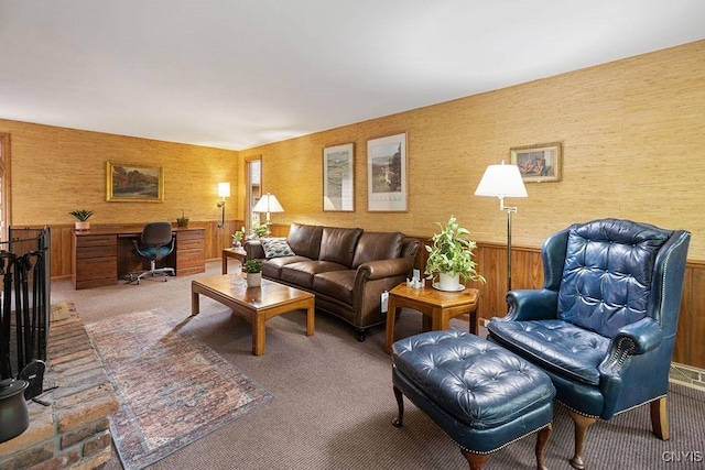 4962 Tall Oaks Dr, Manlius, NY 13066 - living area featuring carpet floors, a desk, wainscoting, and wood walls