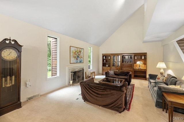 4962 Tall Oaks Dr, Manlius, NY 13066 - living room with light carpet, healthy amount of natural light, a premium fireplace, and high vaulted ceiling