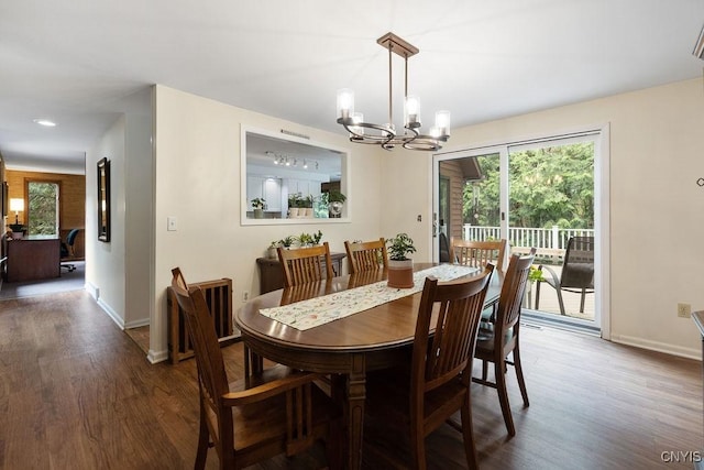 4962 Tall Oaks Dr, Manlius, NY 13066 - dining room with a chandelier and wood finished floors