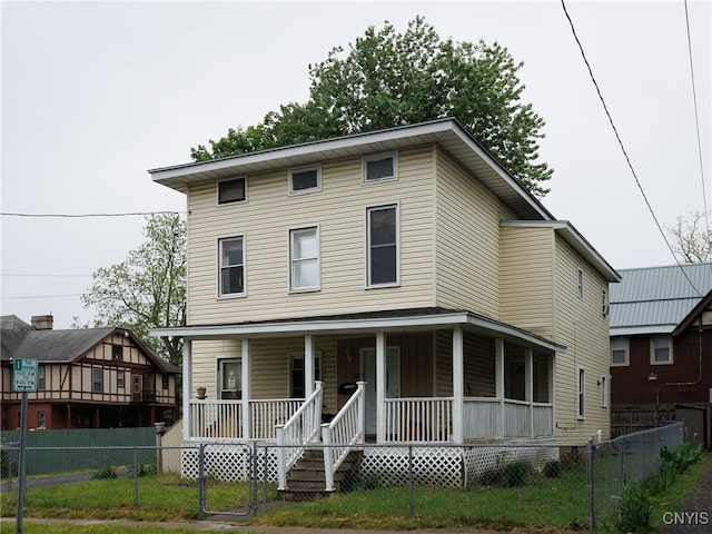 416 Gotham St, Watertown-City, NY 13601 - view of front of house featuring a porch and a fenced front yard