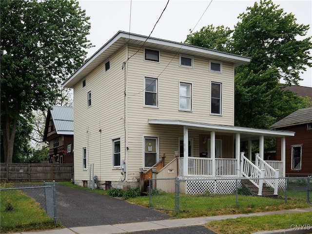 416 Gotham St, Watertown-City, NY 13601 - view of front of home featuring covered porch and a fenced front yard