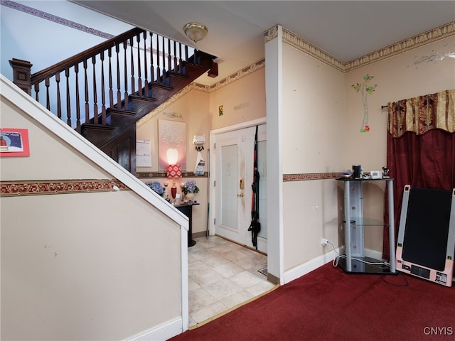 416 Gotham St, Watertown-City, NY 13601 - foyer featuring stairway, baseboards, and carpet floors