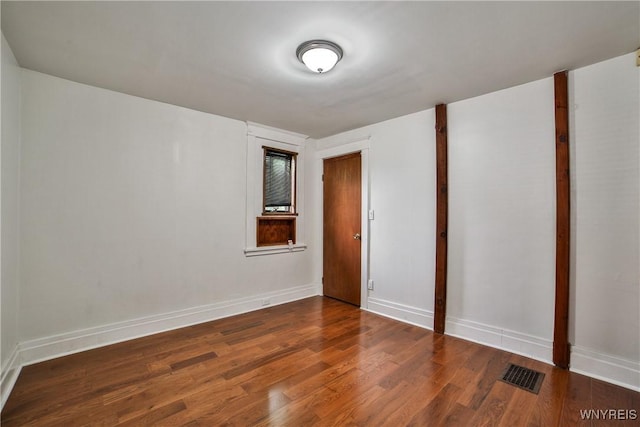 421 E Utica St, Buffalo, NY 14208 - empty room featuring wood finished floors and baseboards