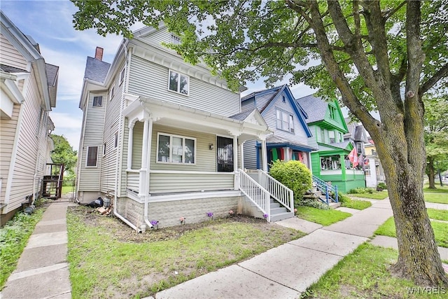 421 E Utica St, Buffalo, NY 14208 - view of front of home featuring a front lawn