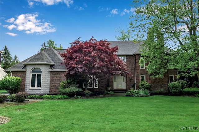 8395 Black Walnut Dr, Clarence, NY 14051 - view of front of property featuring a front yard, roof with shingles, and brick siding