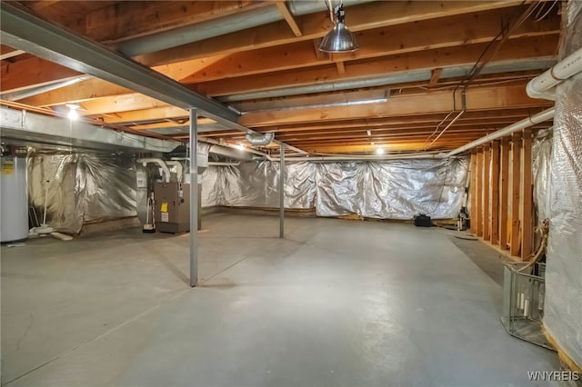 8395 Black Walnut Dr, Clarence, NY 14051 - unfinished below grade area with gas water heater and heating unit