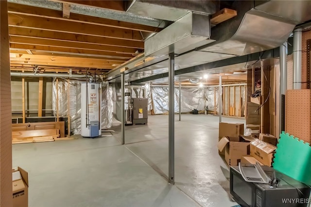 8395 Black Walnut Dr, Clarence, NY 14051 - unfinished below grade area featuring water heater and heating unit