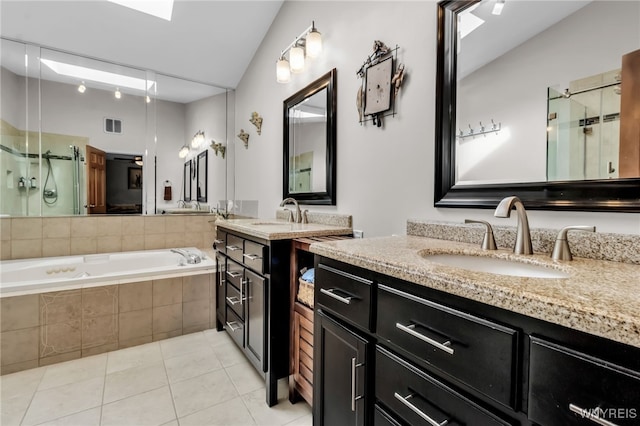 8395 Black Walnut Dr, Clarence, NY 14051 - bathroom with tile patterned flooring, a stall shower, two vanities, a garden tub, and lofted ceiling