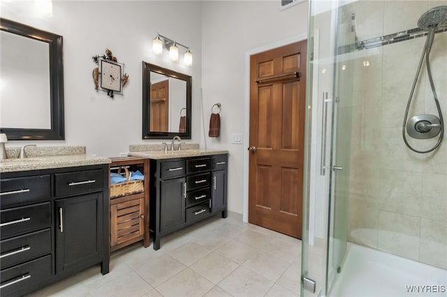 8395 Black Walnut Dr, Clarence, NY 14051 - bathroom with a shower stall, vanity, and tile patterned flooring