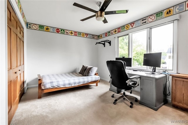 8395 Black Walnut Dr, Clarence, NY 14051 - bedroom featuring light carpet, a closet, an office area, a ceiling fan, and baseboards
