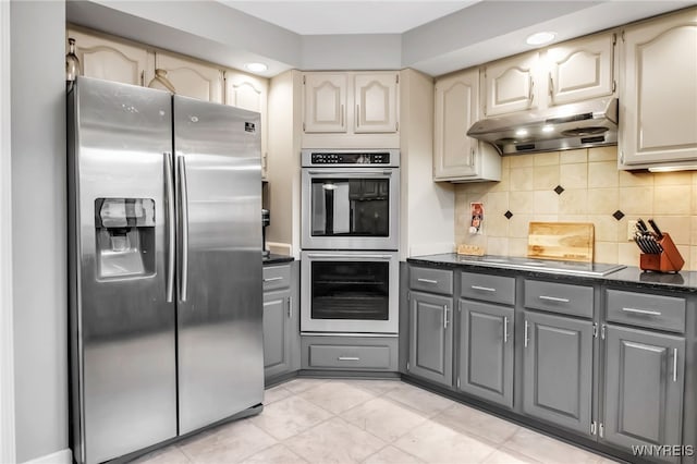 8395 Black Walnut Dr, Clarence, NY 14051 - kitchen with appliances with stainless steel finishes, under cabinet range hood, gray cabinets, and backsplash