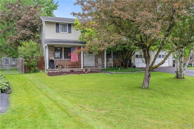 8013 Plinius, Clay, NY 13090 - view of front of house with covered porch, asphalt driveway, and an attached garage