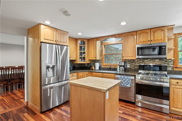 79 Windermere Blvd, Amherst, NY 14226 - kitchen with appliances with stainless steel finishes, a sink, wood counters, dark wood-style flooring, and tasteful backsplash