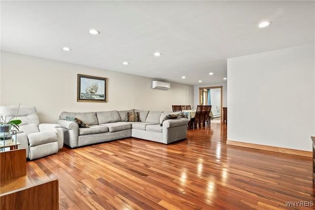 79 Windermere Blvd, Amherst, NY 14226 - living room featuring a wall mounted AC, light wood-style flooring, and recessed lighting