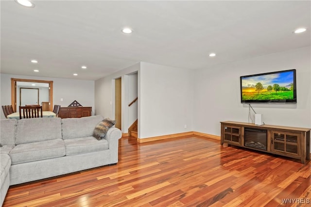 79 Windermere Blvd, Amherst, NY 14226 - living area with light wood-type flooring, recessed lighting, stairway, and baseboards