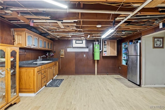 79 Windermere Blvd, Amherst, NY 14226 - kitchen with freestanding refrigerator, a sink, light wood-type flooring, glass insert cabinets, and brown cabinets
